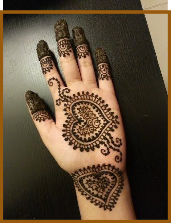 Heart shaped mandala in minimal front hand mehndi design Heart shaped mandala in minimal front hand mehndi design