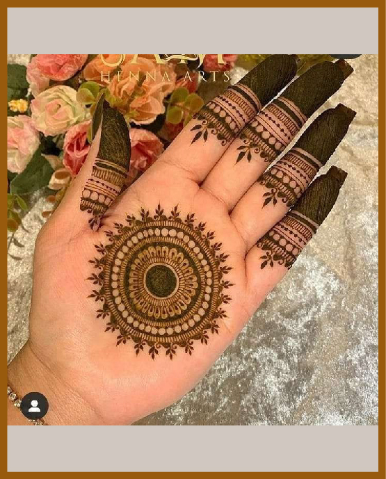 Minimal front hand mehndi design featuring spiral mandala Minimal front hand mehndi design featuring spiral mandala