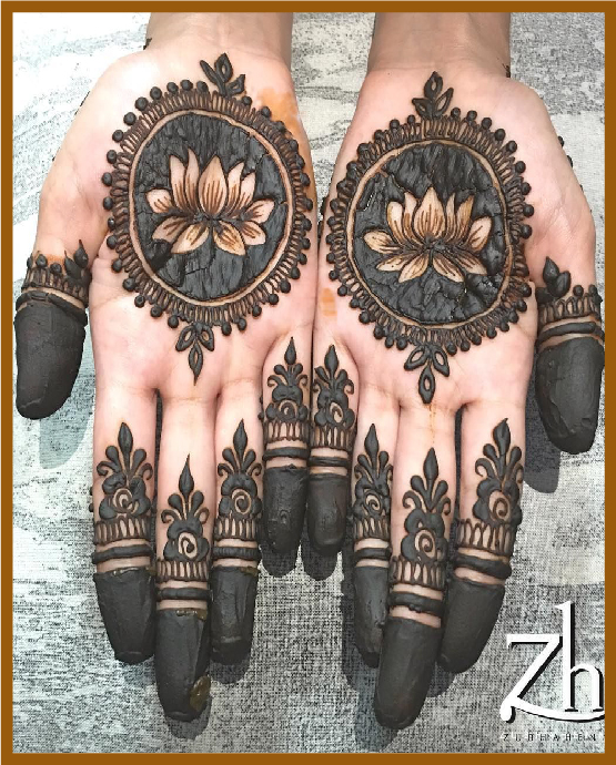 Minimal front hand mehndi design with mirror mandalas Minimal front hand mehndi design with mirror mandalas