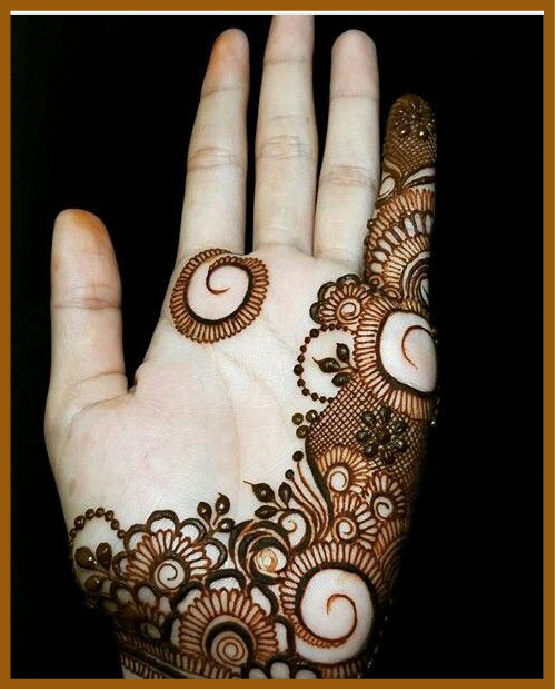 Minimal front hand mehndi design with single flower curl Minimal front hand mehndi design with single flower curl
