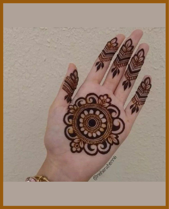 Side palm minimal front hand mehndi design with mandala Side palm minimal front hand mehndi design with mandala