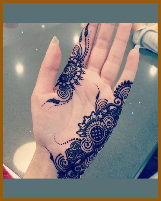 Twisted wrist ring in minimal front hand mehndi design Twisted wrist ring in minimal front hand mehndi design