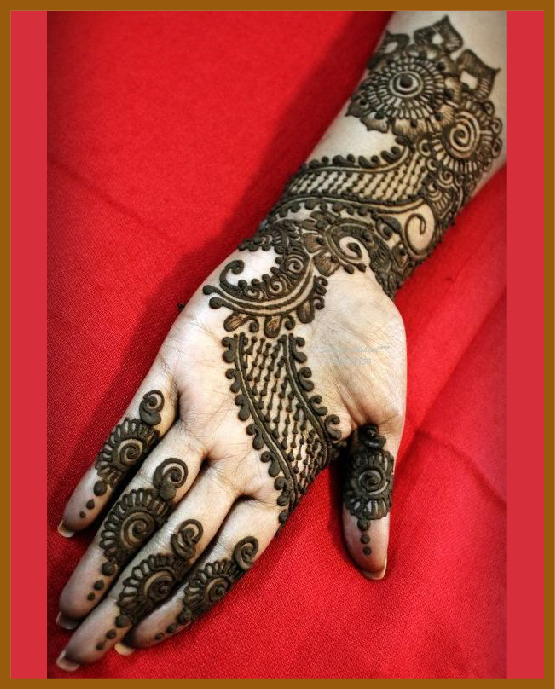 Modern front hand mehndi design with symmetric shapes Modern front hand mehndi design with symmetric shapes