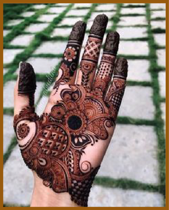 Decorative swirl clouds in royal front hand mehndi design Decorative swirl clouds in royal front hand mehndi design