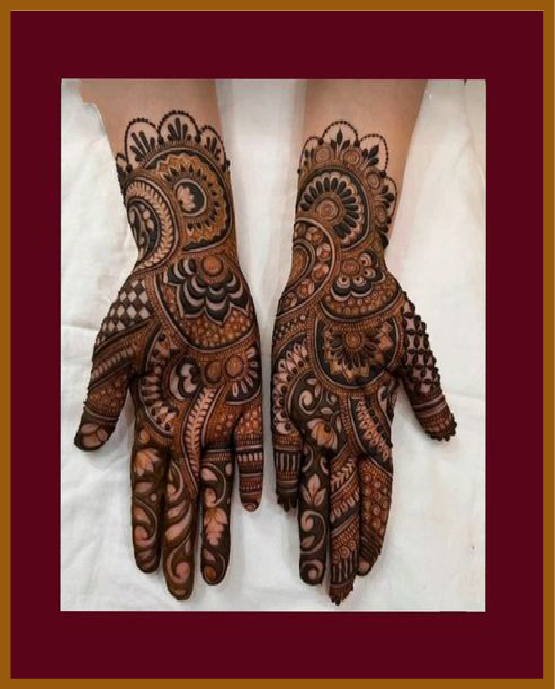 Layered curves and domes in royal front hand mehndi design Layered curves and domes in royal front hand mehndi design