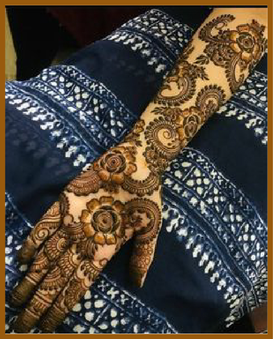 Royal front hand mehndi design featuring temple bells Royal front hand mehndi design featuring temple bells