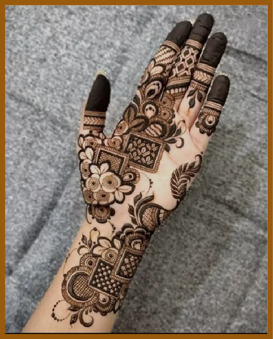 Royal front hand mehndi design with elite geometrical detailing Royal front hand mehndi design with elite geometrical detailing