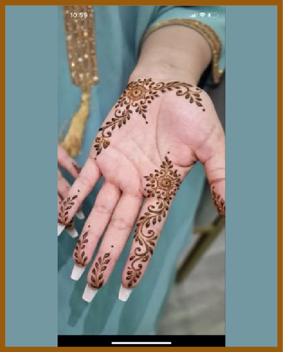 Minimal chain touch in simple front hand mehndi design Minimal chain touch in simple front hand mehndi design