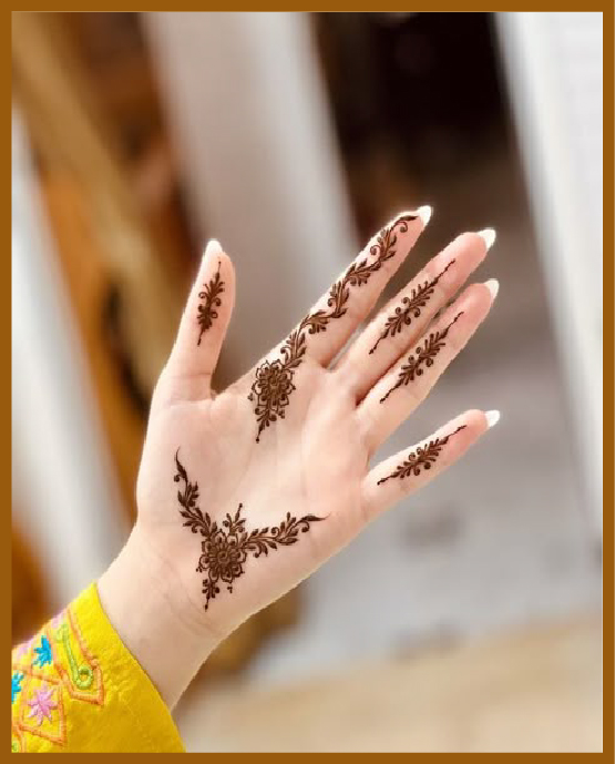 Simple front hand mehndi design using delicate vines Simple front hand mehndi design using delicate vines
