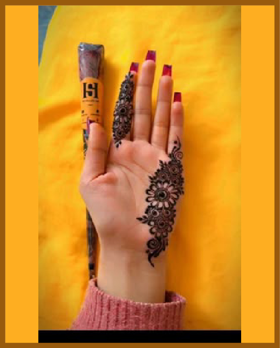 Simplified floral strip in front hand mehndi design Simplified floral strip in front hand mehndi design