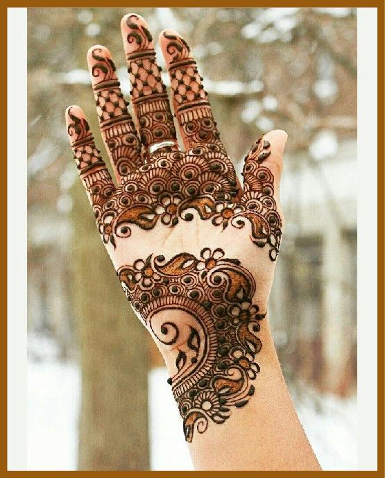 Artistic wrist chain in stylish front hand mehndi design Artistic wrist chain in stylish front hand mehndi design