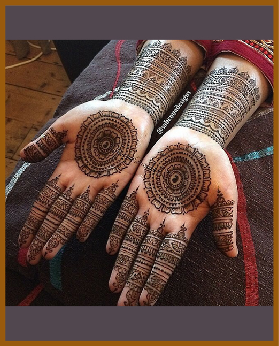 Bold patterned stylish front hand mehndi design with florals Bold patterned stylish front hand mehndi design with florals