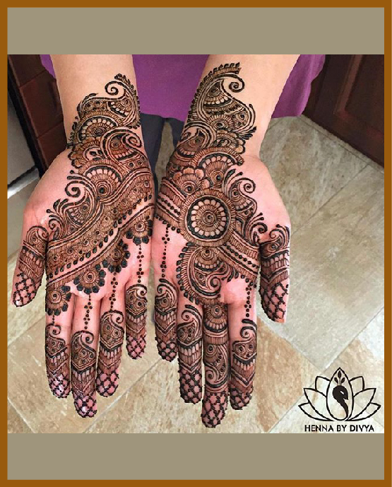 Geometric lines and petals in stylish front hand mehndi design Geometric lines and petals in stylish front hand mehndi design
